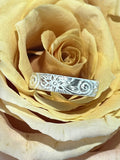 Silver sunflower swirl ring